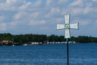 Cross sign by the ocean